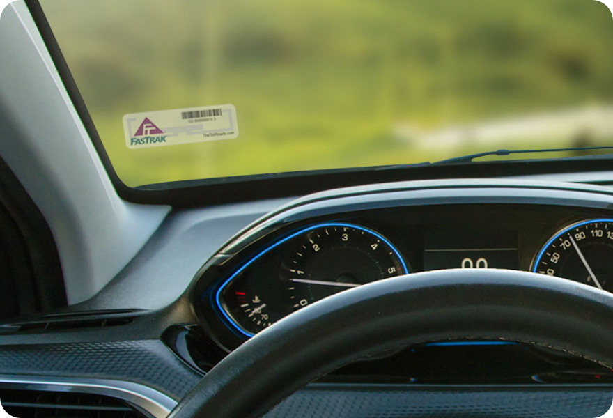 FasTrak transponder sticker installed on the inside of a windshield